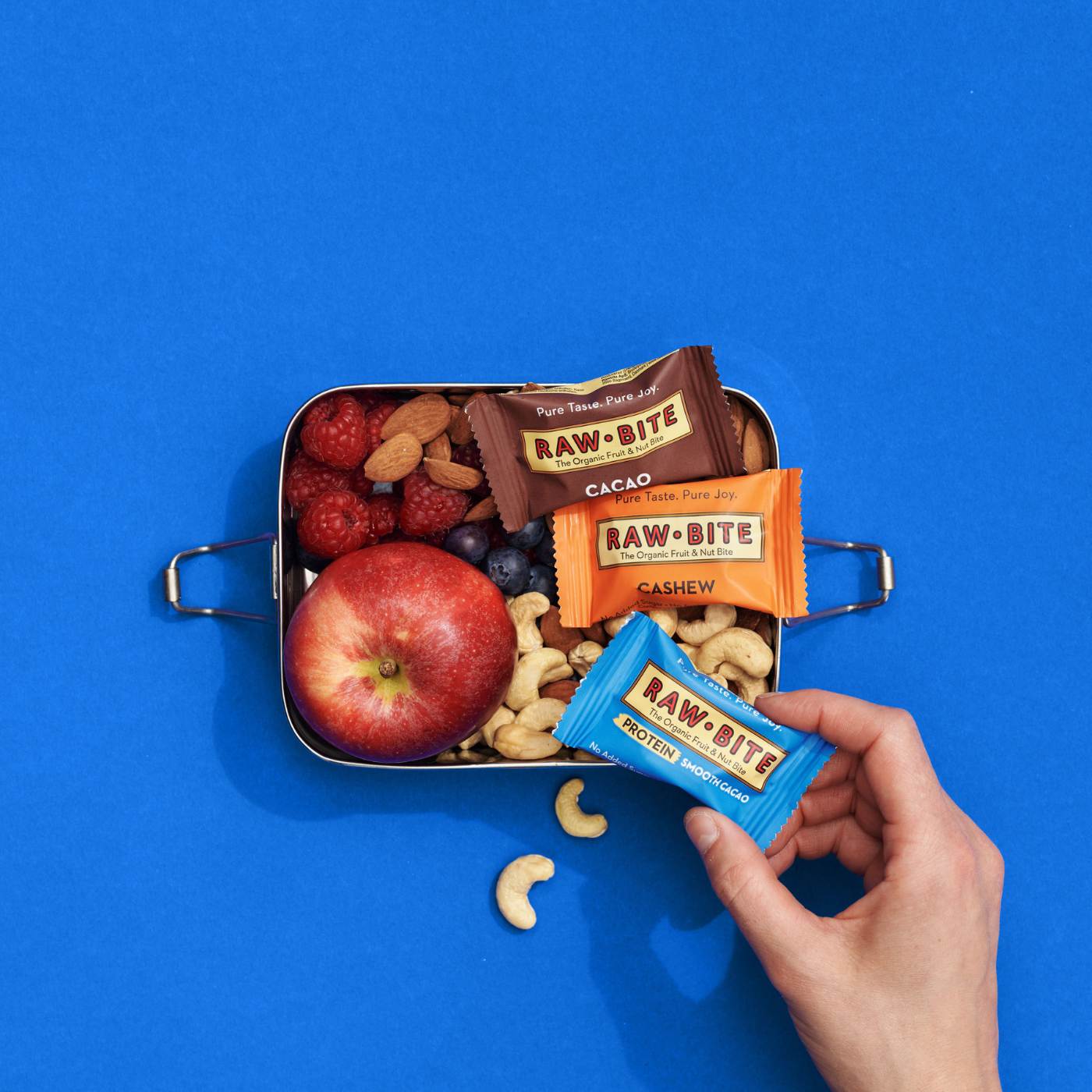 Lunchbox with RAWBITE minis, fruit and nuts